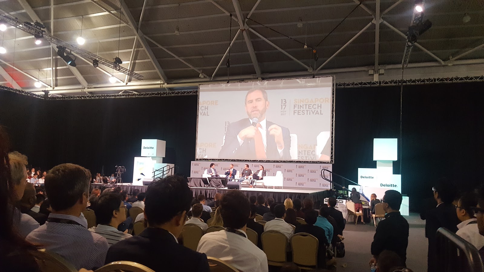 Brad Garlinghouse, CEO of Ripple, breaking down altcoin hype for the audience. Photo credit: Lucia Ziyuan