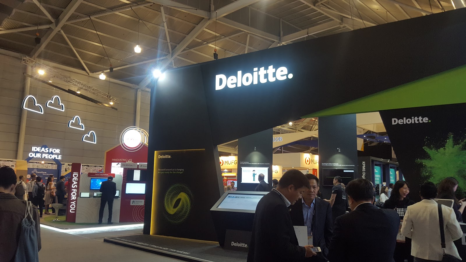 Corporate sponsor booths like Deloitte’s take up the majority of exhibition real estate